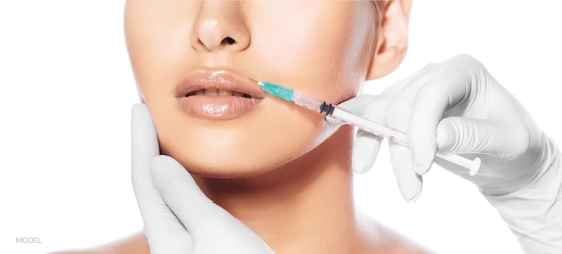 woman getting injectable fillers