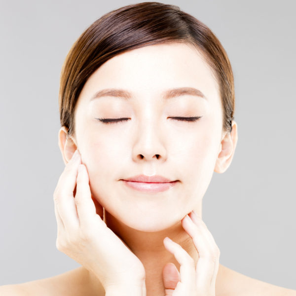 shutterstock_616007231 (1) asian girl closing eyes